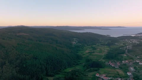 Panoramic View Of Mountain, Seascape And Wind Turbines During Sunset Stock Footage 247765684