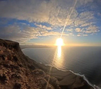 Panoramic view from a mountain top overlooking the volcanic coastline of Stock Photos