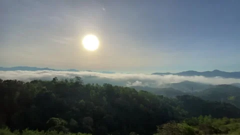 Panoramic view from a mountain top at sunrise with valley of clouds. Stock Footage 279897364