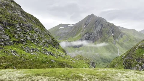 Panoramic view of mountains and clouds from high Stock Footage 338358229