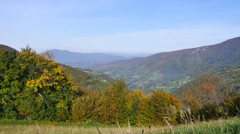 Panoramic view of mountains and forest with blue sky Video stock 42999382