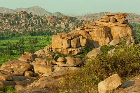 Panoramic view of mountains and large rocks in sunset light in Hampi in Karna Stock Photos