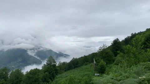Panoramic view of the mountains in the clouds Stock Footage 153070626