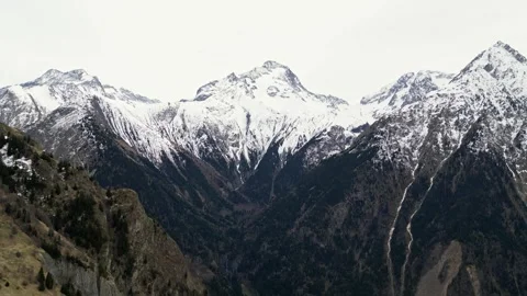 Panoramic view of the mountains from Les Deux Alps ski resort in the French Alps Stock Footage 244407393