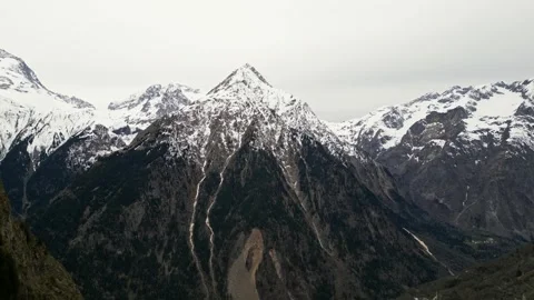 Panoramic view of the mountains from Les Deux Alps ski resort in the French Alps Stock Footage 244407722