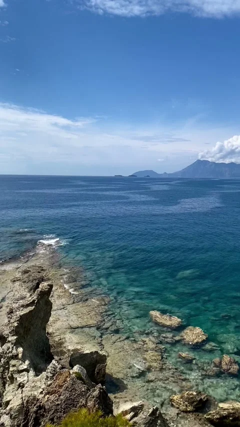Panoramic view of the mountains of the Phaselis coast near Kemer, Turkey. Video stock 342011696
