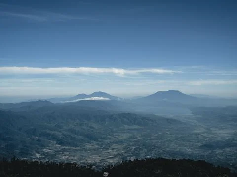 Panoramic View of Mounts Marapi and Singgalang from a Higher Summit Stock Photos