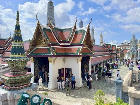 Panoramic view of multi-tiered roofs and sparkling blue spires at Wat Phra Stock Photos