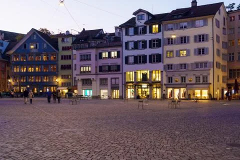 Panoramic view of Munsterhof square with Guild houses at night, Zurich, Switz Stock Photos
