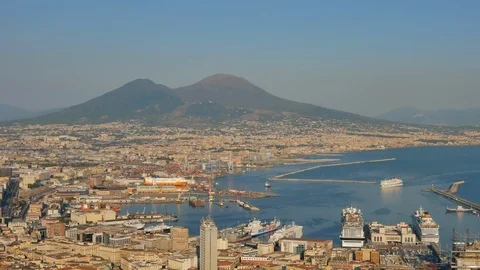 Panoramic view on Naples harbour and Vesuvius on golden hour Stock Footage 120590319