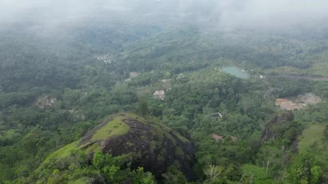 Panoramic view of the Nglanggeran Ancient Volcano ecotourism area in the morning Stock Footage 233233738