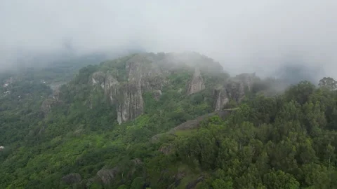 Panoramic view of the Nglanggeran Ancient Volcano ecotourism area in the morning Stock Footage 233233847