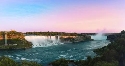 Panoramic view of Niagara Falls and city skyline on sunny day in Ontario Canada. Stock Photos