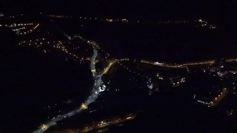 PANORAMIC VIEW OF NIGHT OVER STREET IN THE MOUNTAIN Stock Footage