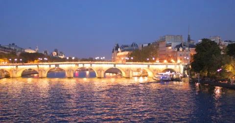 Panoramic view of night Seine river and Pont Neuf bridge in Paris, France 스톡 동영상 125216004