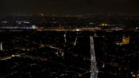 Panoramic view night time of Paris with Louvre in the far background  Stock Footage 99952892
