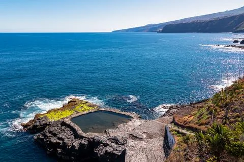 Panoramic view on the Ocean Pool Piscina Natural de Laja de la Sal near the.. Stock Photos