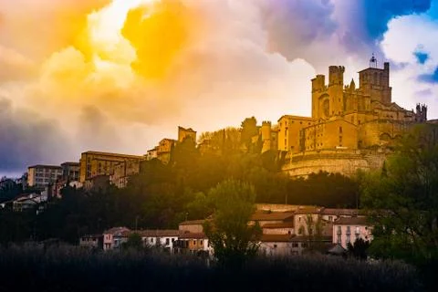Panoramic view at the Old Bridge over Orb river with Cathedral in Beziers Stock Photos