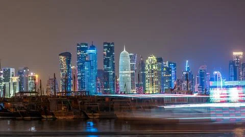 A panoramic view of the old dhow harbor night timelapse in Doha, Qatar, with  Fotos de archivo