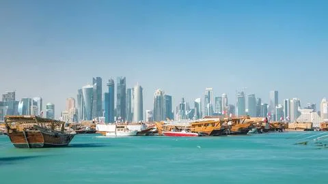 A panoramic view of the old dhow harbour timelapse in Doha, Qatar, with the.. Fotos de archivo