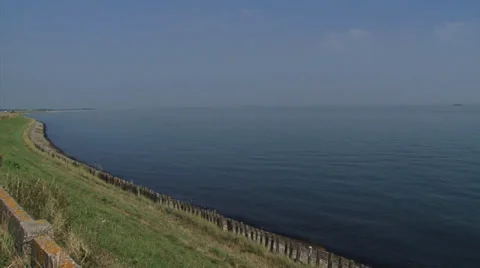 Panoramic view from an old dike across the water of the Eastern Scheldt estuary Stock Footage 33157888