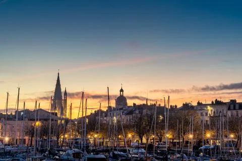 Panoramic view of the old harbor of La Rochelle at blue hour Stock Photos