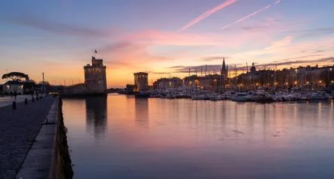Panoramic view of the old harbor of La Rochelle at blue hour Stock Photos
