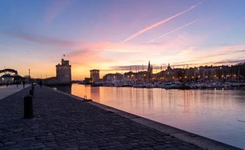 Panoramic view of the old harbor of La Rochelle at blue hour Stock Photos