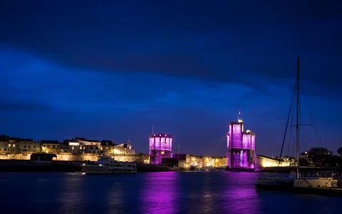 Panoramic view of the old harbor of La Rochelle with its famous towers Stock Photos