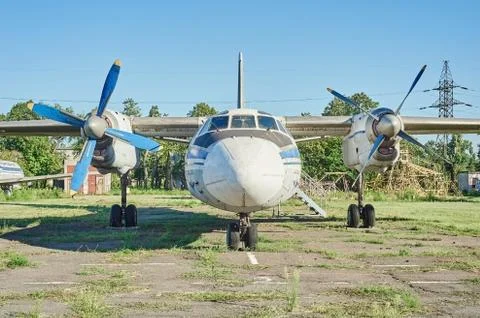 Panoramic view of old soviet aircraft An-24 Antonov at an abandoned aerodrome Fotos Stock