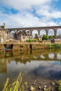 Panoramic view of old stone bridge and historical medieval houses reflectin.. Stock Photos
