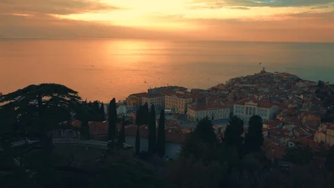 Panoramic view on Old Town Piran on the sea cost at sunset. Stock Footage 99965452