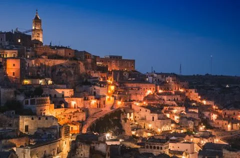 Panoramic view of old town Sassi di Matera at night, Basilicata, Italy. Stock Photos