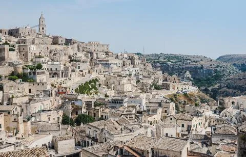 Panoramic view of old town Sassi di Matera at sunset, Basilicata, Italy. Stock Photos