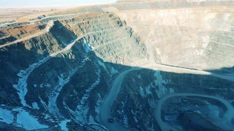 Panoramic view of an open-pit copper mine Photos