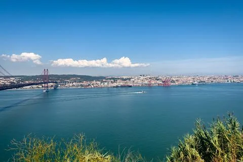 Panoramic view over the 25th april bridge in Lisbon Stock Photos
