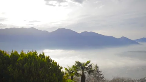 Panoramic View over Alpine Lake Maggiore with Mountain and City with Sea of Fog Stock-Footage 135564492