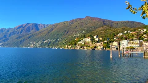 Panoramic View over Alpine Lake Maggiore and City of Ascona with Mountain 库存影片 163950799