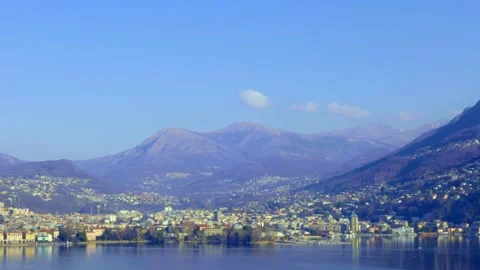Panoramic View over Alpine Lake Lugano and City with Mountain Stock Footage 191938625