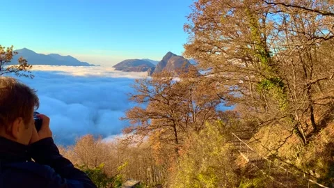 Panoramic View over Alpine Lake Lugano with Sea of Clouds and Mountain Stock Footage 194011666