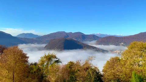 Panoramic View over Alpine Lake Lugano on the Border to Italy with Sea of Clouds 動画素材 194011671
