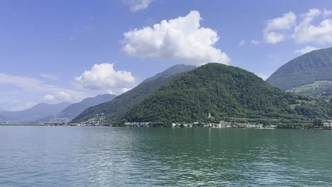 Panoramic View over Alpine Lake Lugano and Mountain in a Sunny Day Vídeos de archivo 247329294