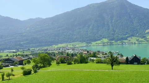 Panoramic View over City Arth Goldau and Lake Zug with Mountain in a Sunny Stock Footage 251165379