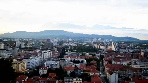 Panoramic view over city during cloudy afternoon in Ljubljana. Видео 152576091