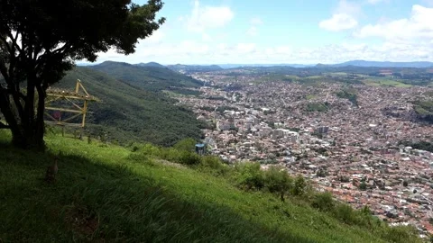 Panoramic view over city of Pocos de Caldas, Minas Gerais, Brazil, and cable Видео 328970886