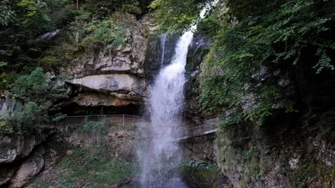 Panoramic View over Giessbach Waterfall with Elevated Walkway Stockbeeldmateriaal 264476306