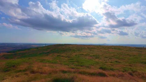Panoramic view over green fields from high hill lookout in Ireland Stock Footage 340435671