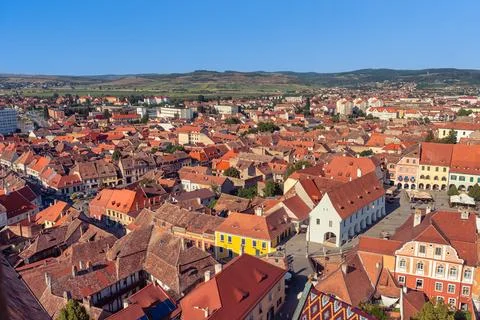 Panoramic view over historic rooftops and central Sibiu cityscape in Transylv Fotos Stock