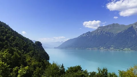 Panoramic View over Lake Brienz with Mountainscape in a Sunny Summer Day Stockbeeldmateriaal 264576289