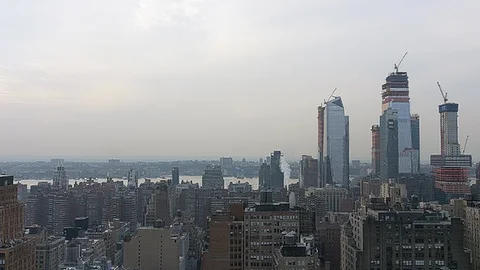Panoramic View over Manhattan from Skyscraper Rooftop during sunset Stock Footage 92578254